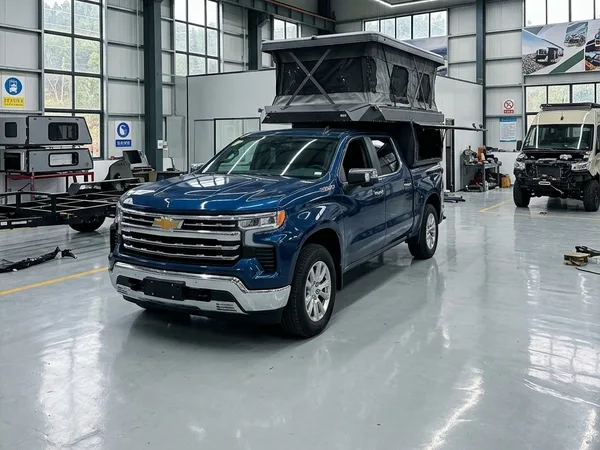 SUNHOMEE camper on a Chevy Silverado / GMC Sierra